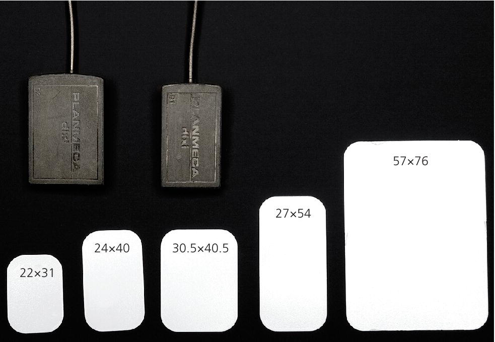 Photo displaying two different sensor sizes (top) and five different phosphor plate sizes with numbers indicating dimensions in millimeters (bottom).